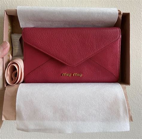 miu miu madras wallet price|farfetch miu miou wallet.